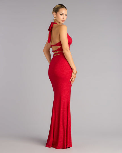 Own any formal or milestone moment in the Maribeth Glitter Strappy Back Mermaid Formal Dress, a red glitter dress designed for bold, spotlight-stealing style.
