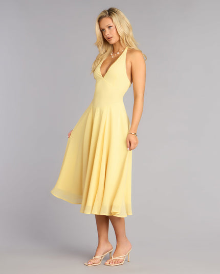 Style a midi dress like Effortless Grace Chiffon Midi Dress in yellow with a balanced silhouette, comfortable fit, and versatile design for any occasion.