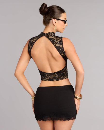 Create a stylish look with a crop top like the All Eyes Lace Up Open Back Crop Top in black, designed with a modern silhouette, sleek fit, and versatile design easy to pair with jeans, skorts, or skirts.