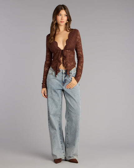 A trendy top that helps you feel festive and fashion-forward—style the Delicate Flair Floral Lace Tie-Front Top your way for parties, brunch with friends, or wherever you’re headed.