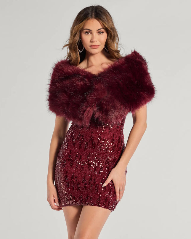 Whether you're dressing up for a romantic date or a Galentine's event, the Ms. Diva Faux Fur Shawl in burgundy is the perfect accessory to elevate your Valentine's Day outfit.
