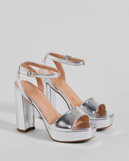Style made simple with the Ready To Slay Platform Heels in silver, trendy women’s shoes that take your outfit from basic to bold in one step.
